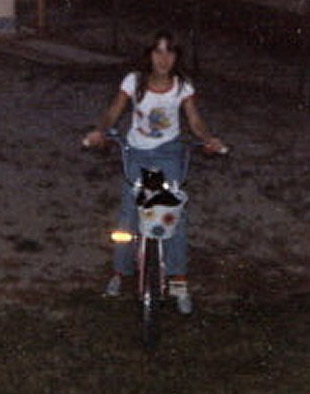 Julie and Mittens on a bike