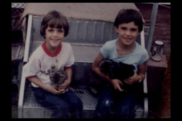 Lee holding Panther, and Julie holding Buttercup